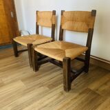 Pair of low wooden and straw armchairs