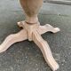Round extendable dining table with a central pedestal base, renovated in raw wood, 150cm