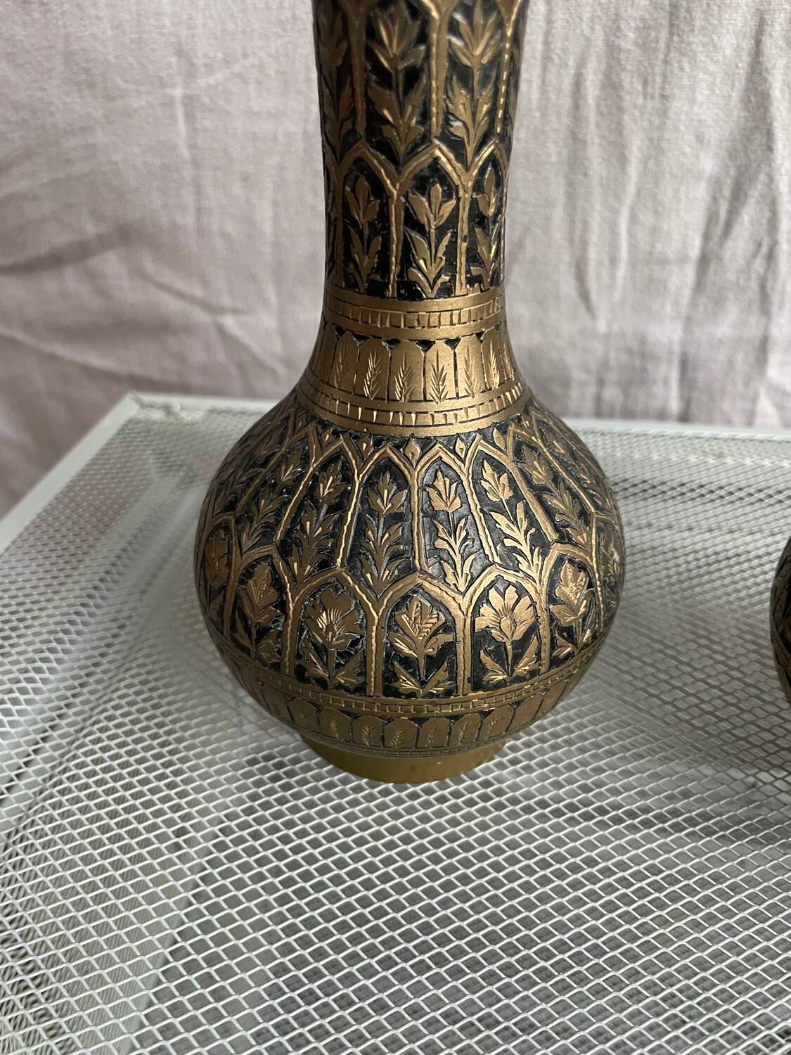 Pair of black and gold metal vase