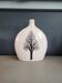 Large single-flower lentil vase