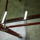 Postmodern Italian design coffee table in smoked glass with red steel structure