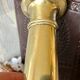 Golden copper candle holder with Belle Epoque pusher