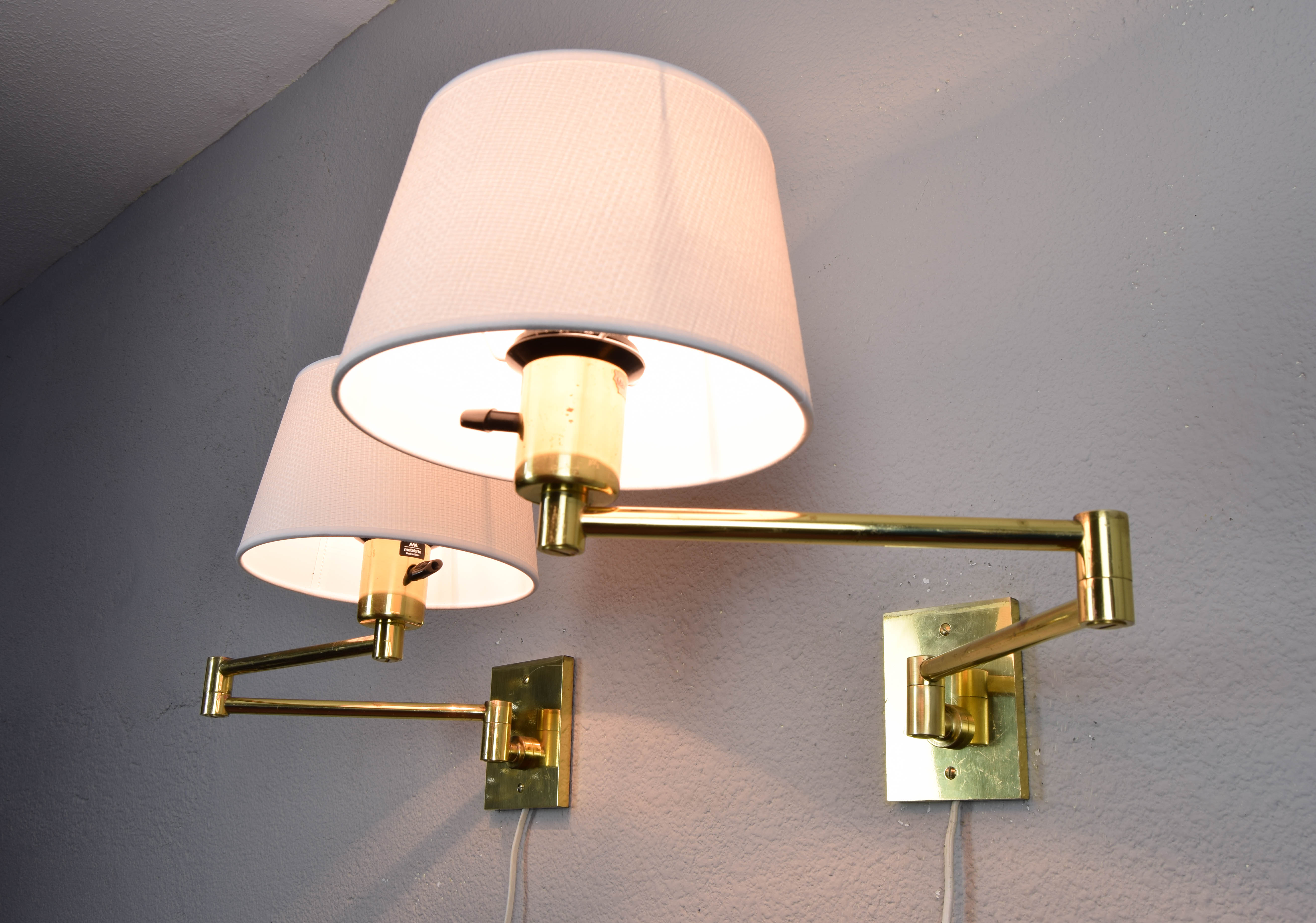 Two Mid-Century Modern Swing Arm Brass Sconces by George W Hansen for Metalarte