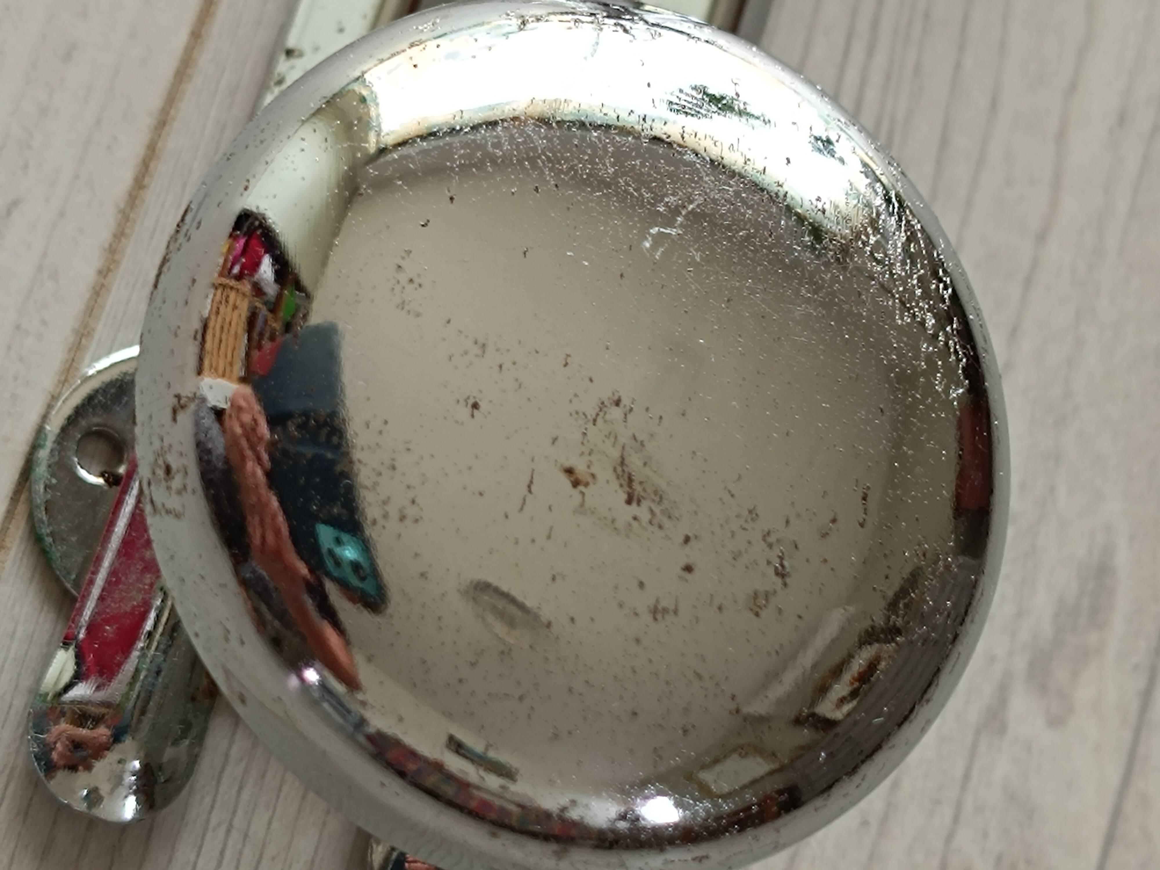 Chrome metal wall coat rack