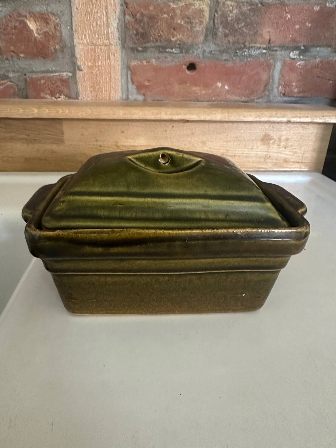 Vintage green majolica butter dish