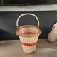 Old oval basket with a wooden base