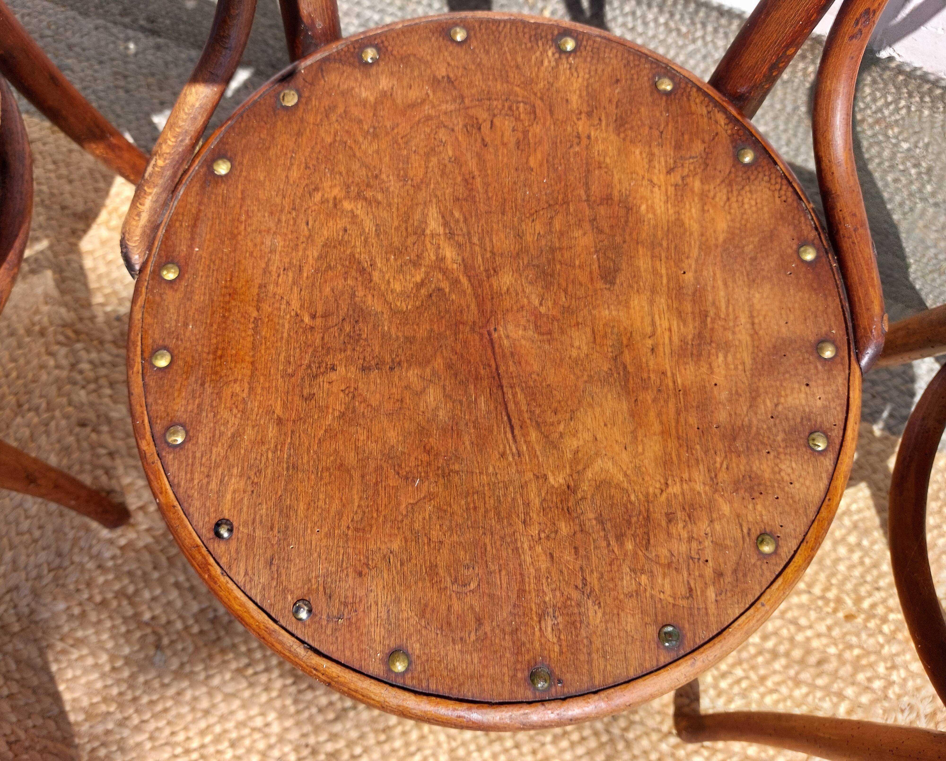 4 curved wooden bistro chairs