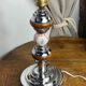 Lamp base in chrome metal, porcelain and wood.