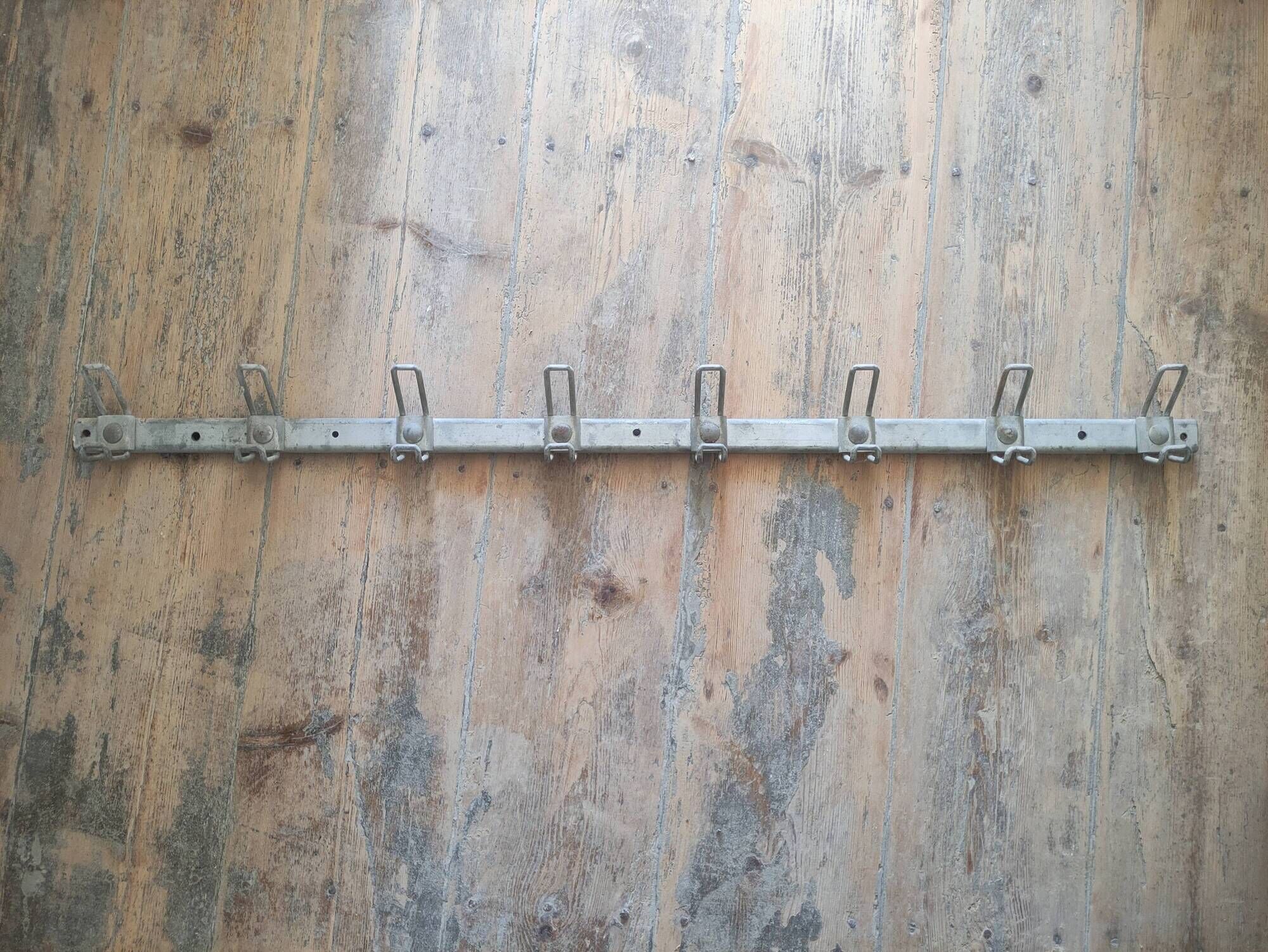 School wall coat rack in metal cloakroom