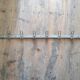 School wall coat rack in metal cloakroom