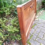 Carved walnut headboard