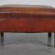 Leather ottoman in classic English style finished with decorative nails