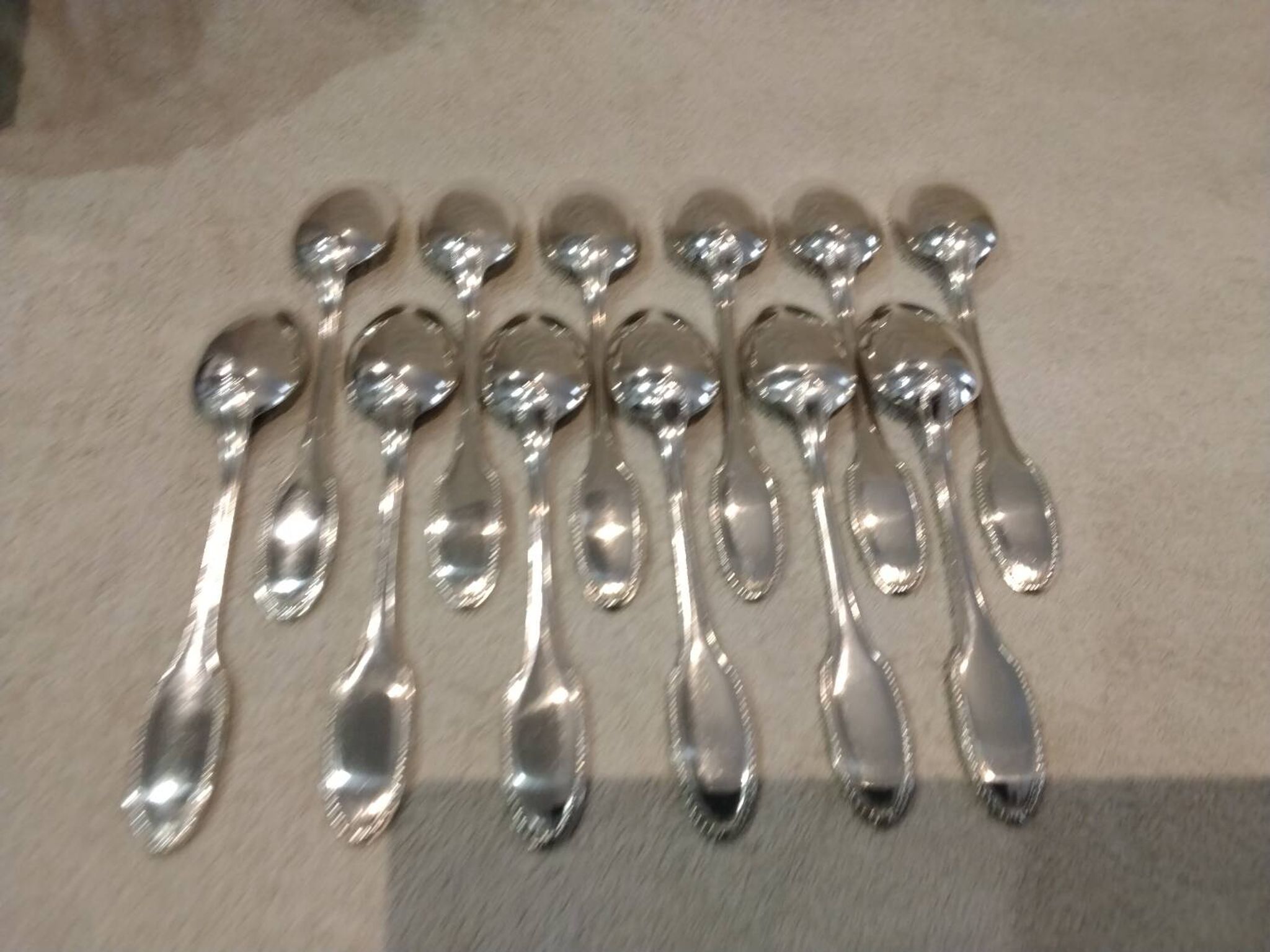 12 silver plated dessert spoons, goldsmith Alfenide, St LXVI pearls