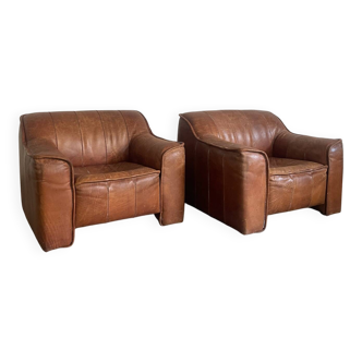 Paire de fauteuils en cuir