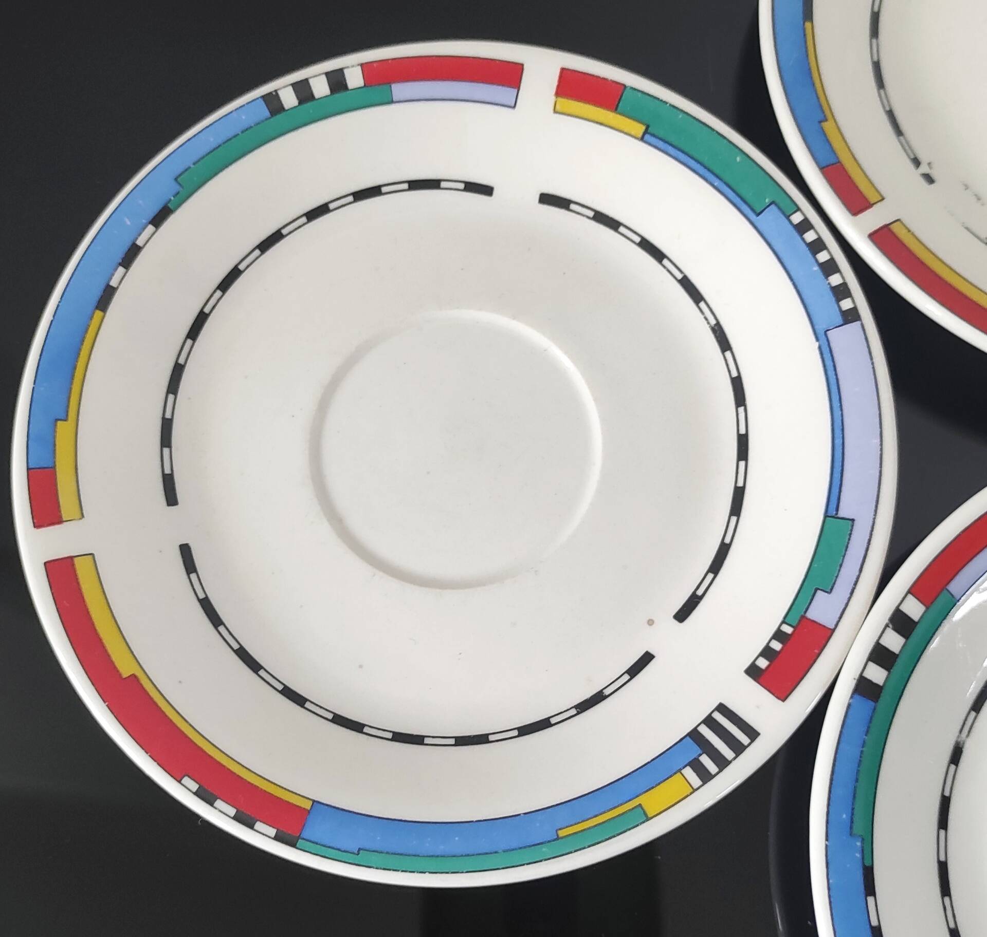 Set of small plates, vintage saucers in porcelain.