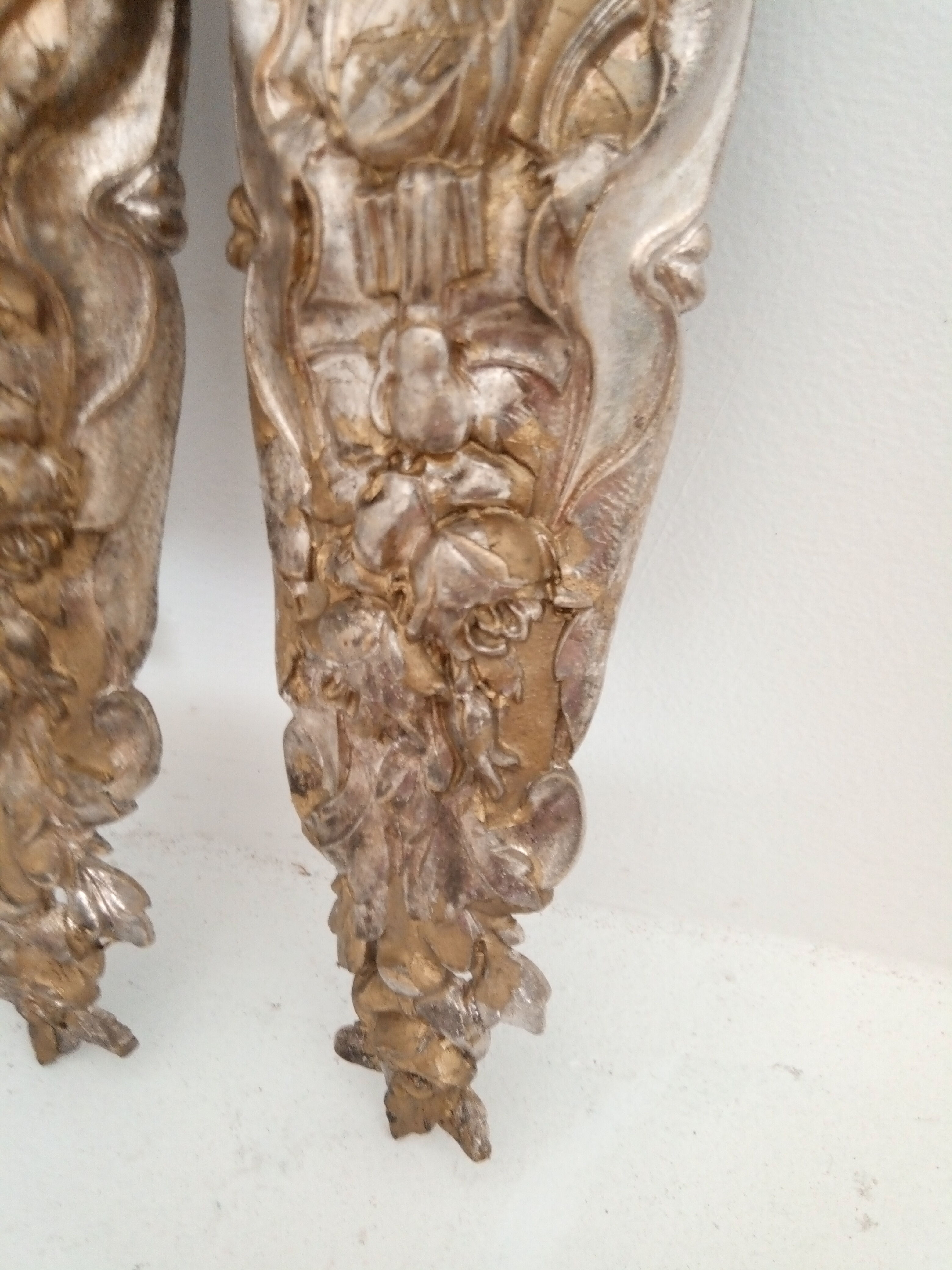 Pair of old pediments, silver bronze furnishings.