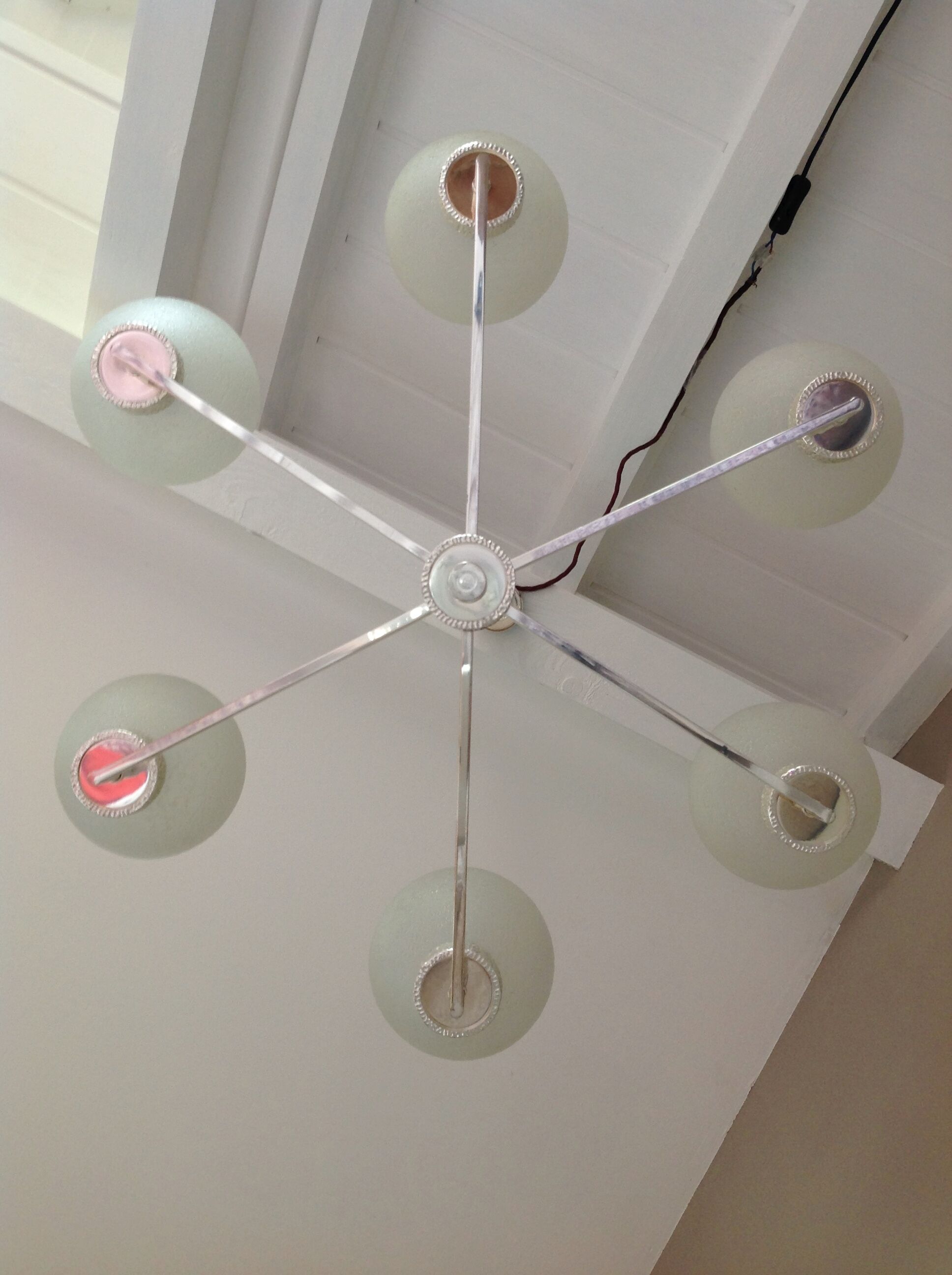 Six-light chrome metal chandelier and opaque glass globes / vintage 60s and 70s