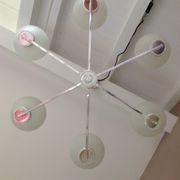 Six-light chrome metal chandelier and opaque glass globes / vintage 60s and 70s