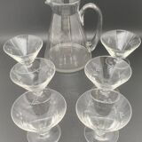 Glass and carafe set with chiseled flower motif