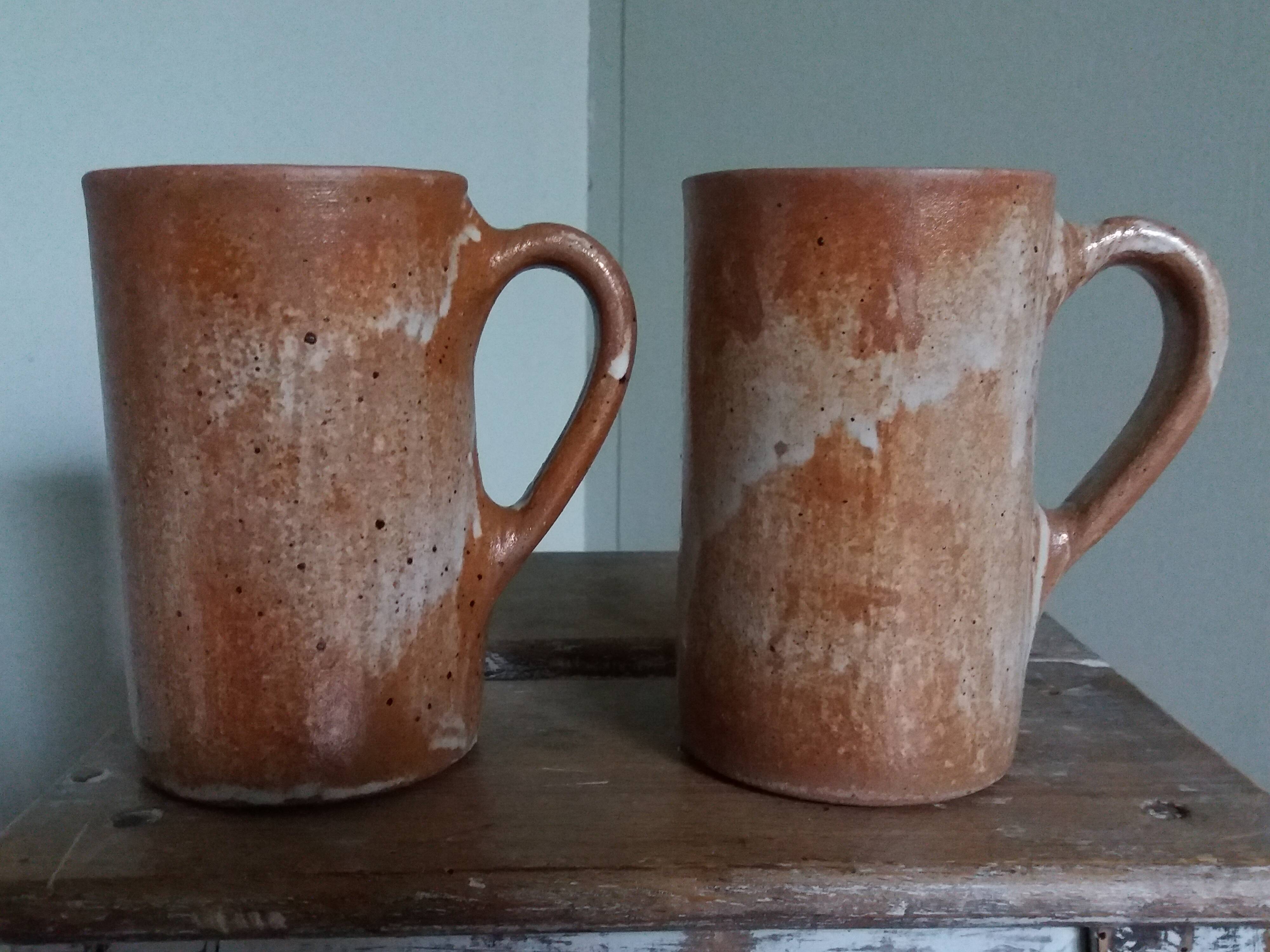 Enamelled stoneware mugs