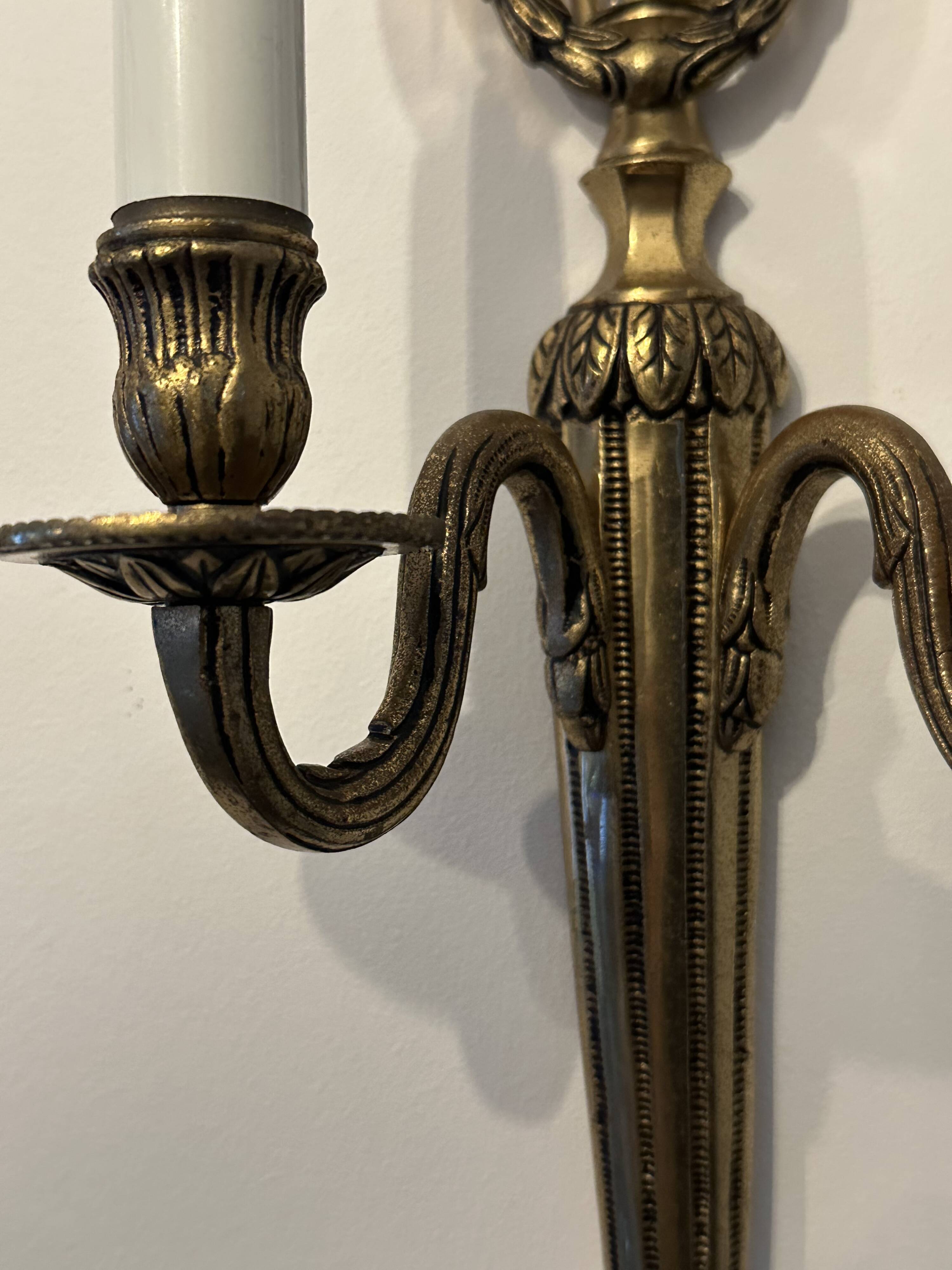 Pair of mid-19th century brass tassel sconces