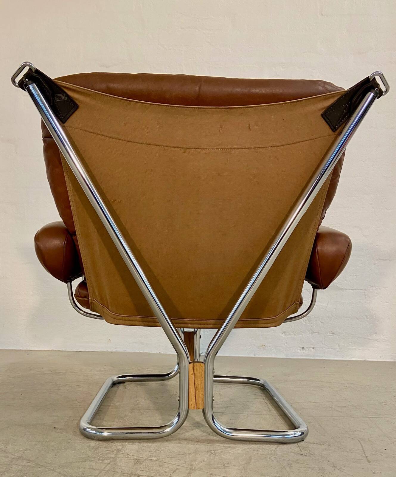 Vintage mid-century Scandinavian cognac leather lounge chair by Harald Relling