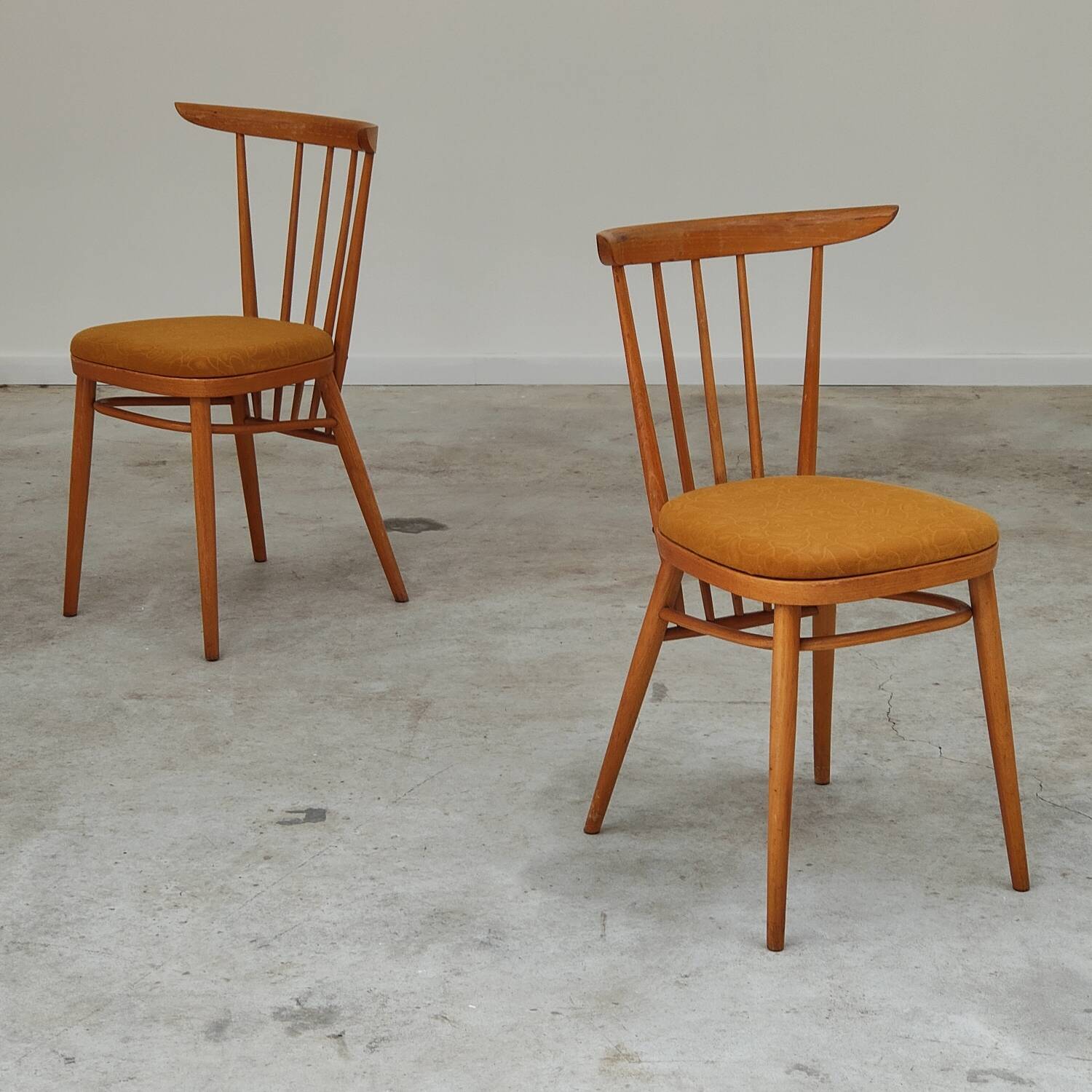 Pair of wooden dining room chairs by Tatra Pravenec 1960