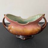 Old earthenware planter. Floral patterns.