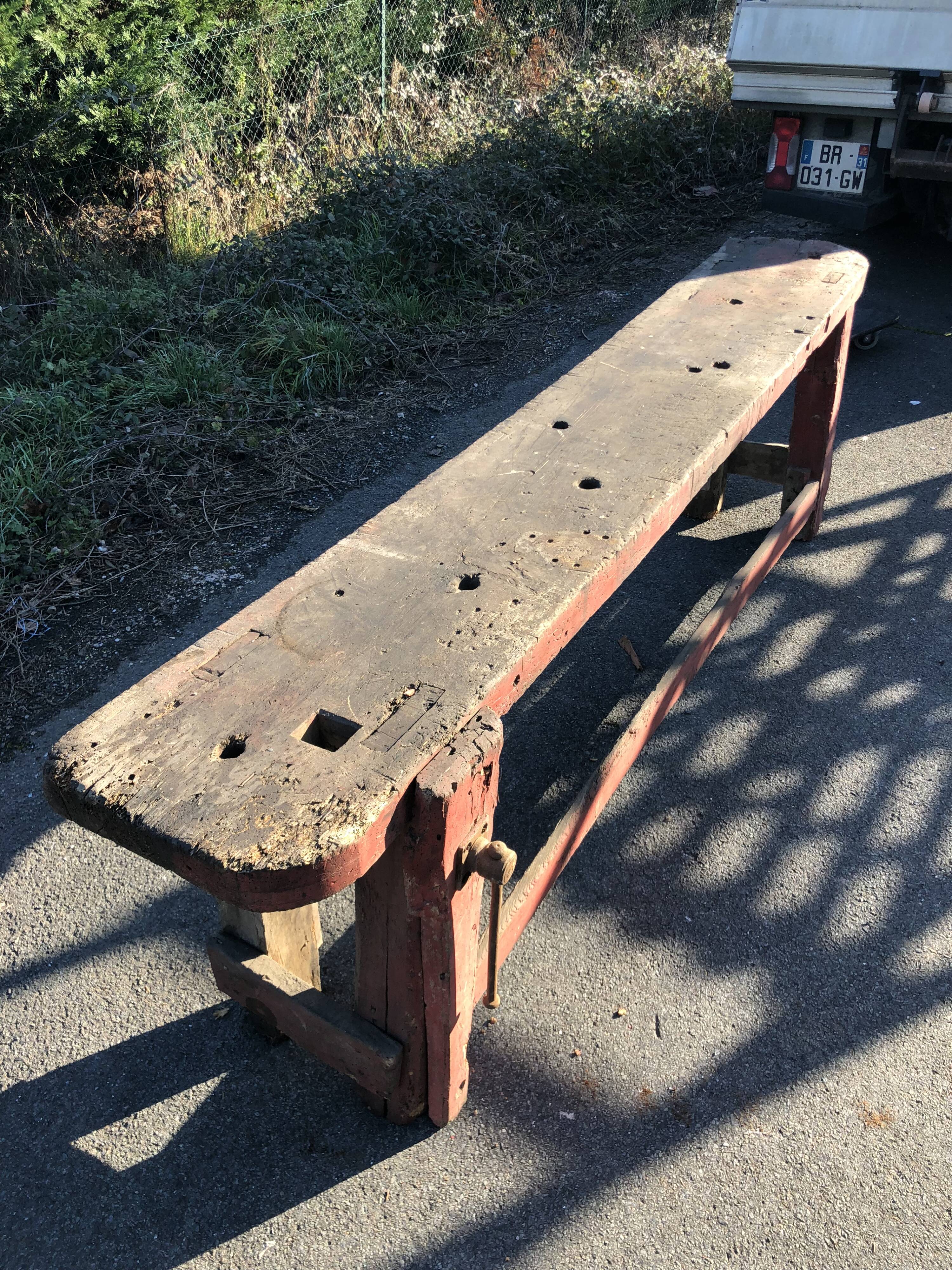 Old carpenter's workbench painted red