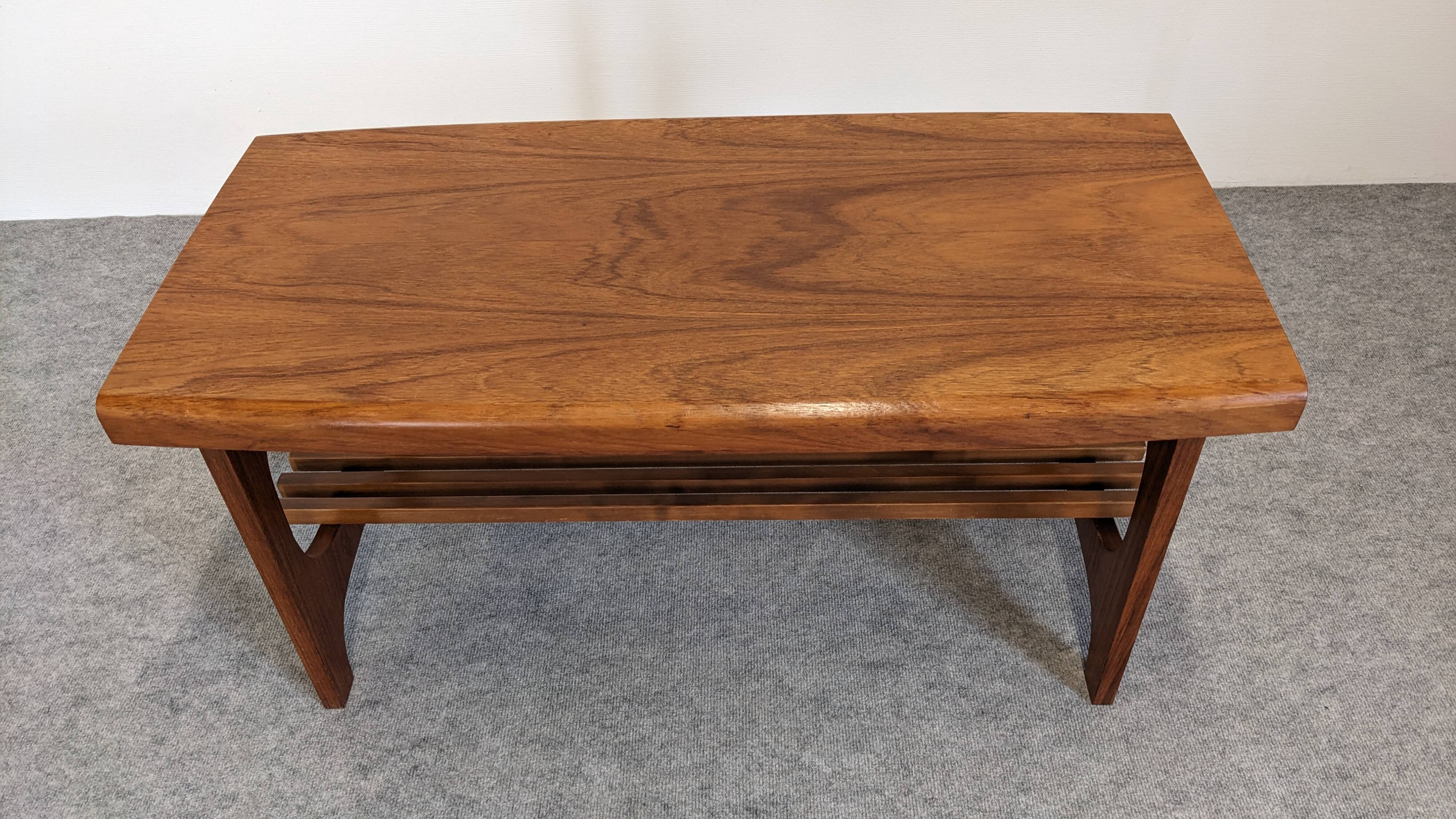 Scandinavian teak coffee table with magazine rack, Sweden circa 1960.