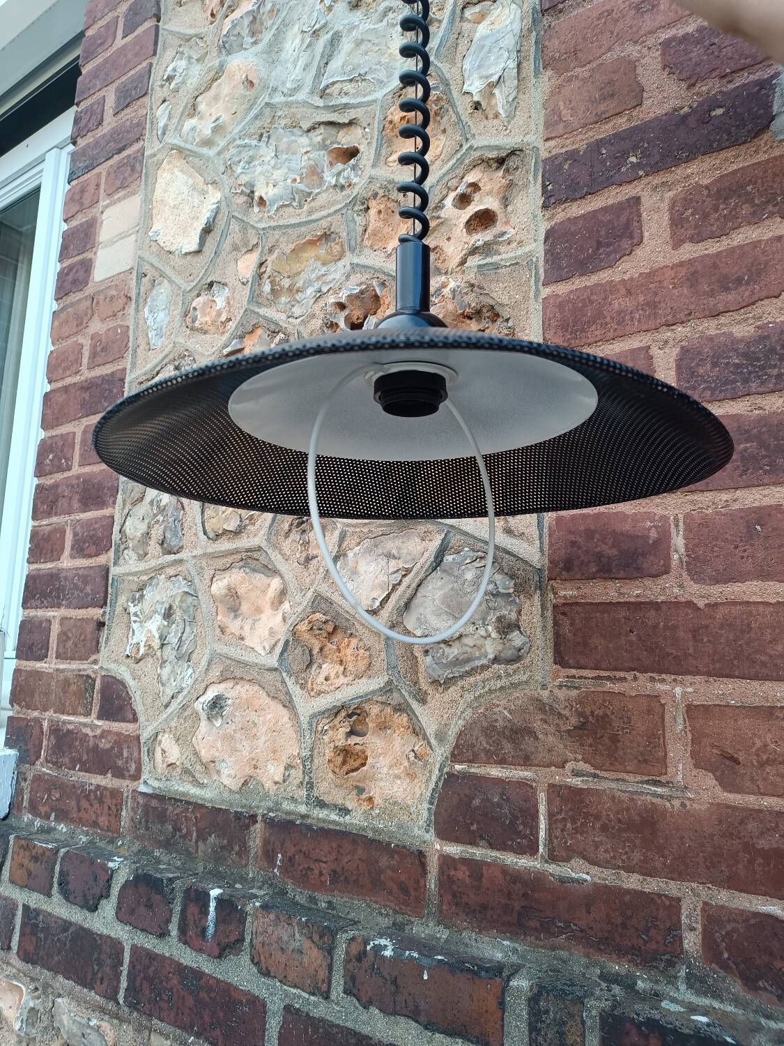 Scandinavian pendant light in perforated sheet metal