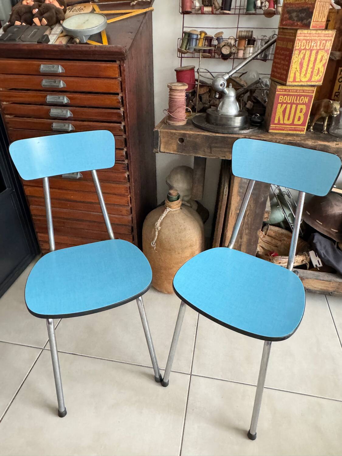 Pair of vintage blue Formica chairs