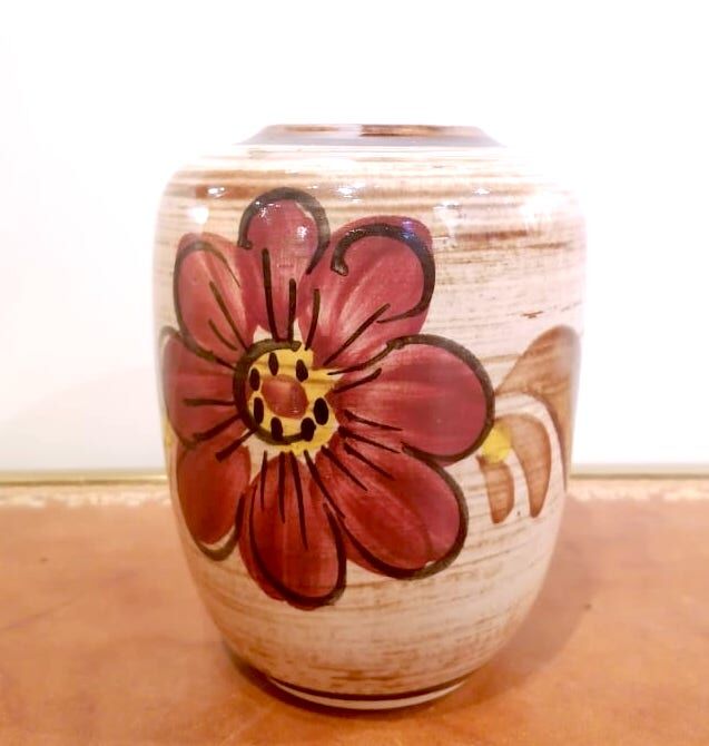 Vintage ceramic vase with flowers