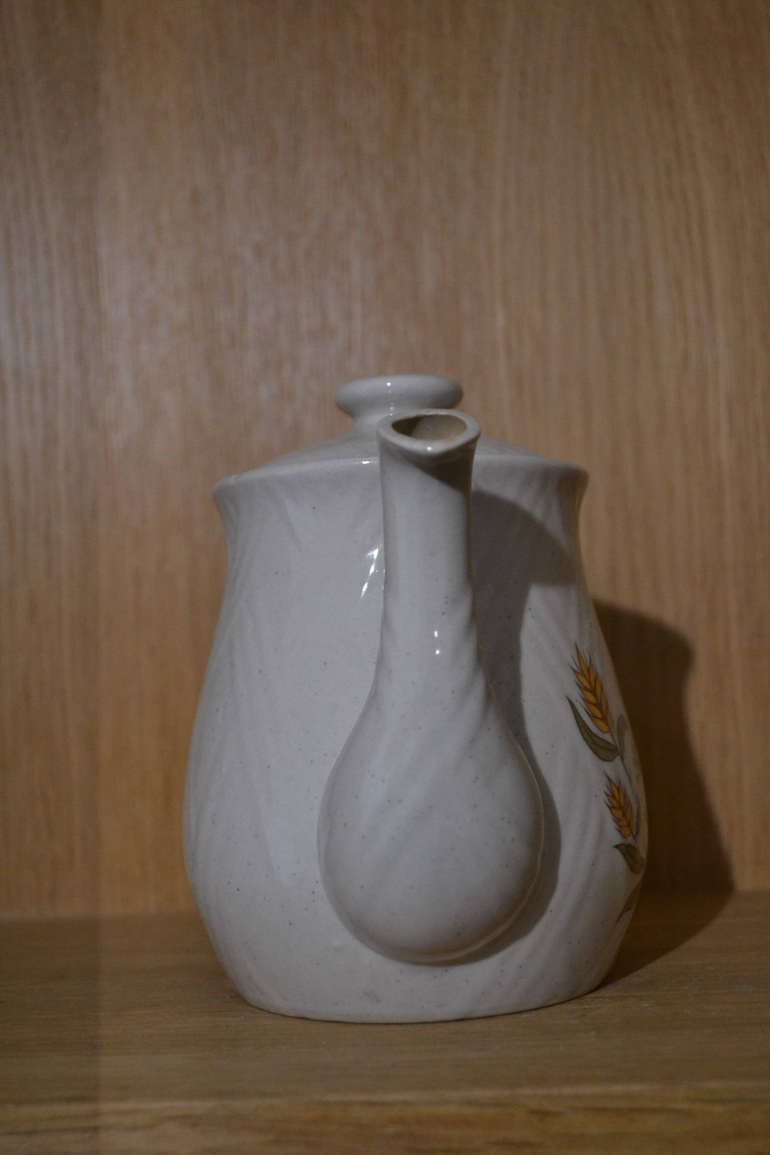 Flower teapot, handmade decoration.