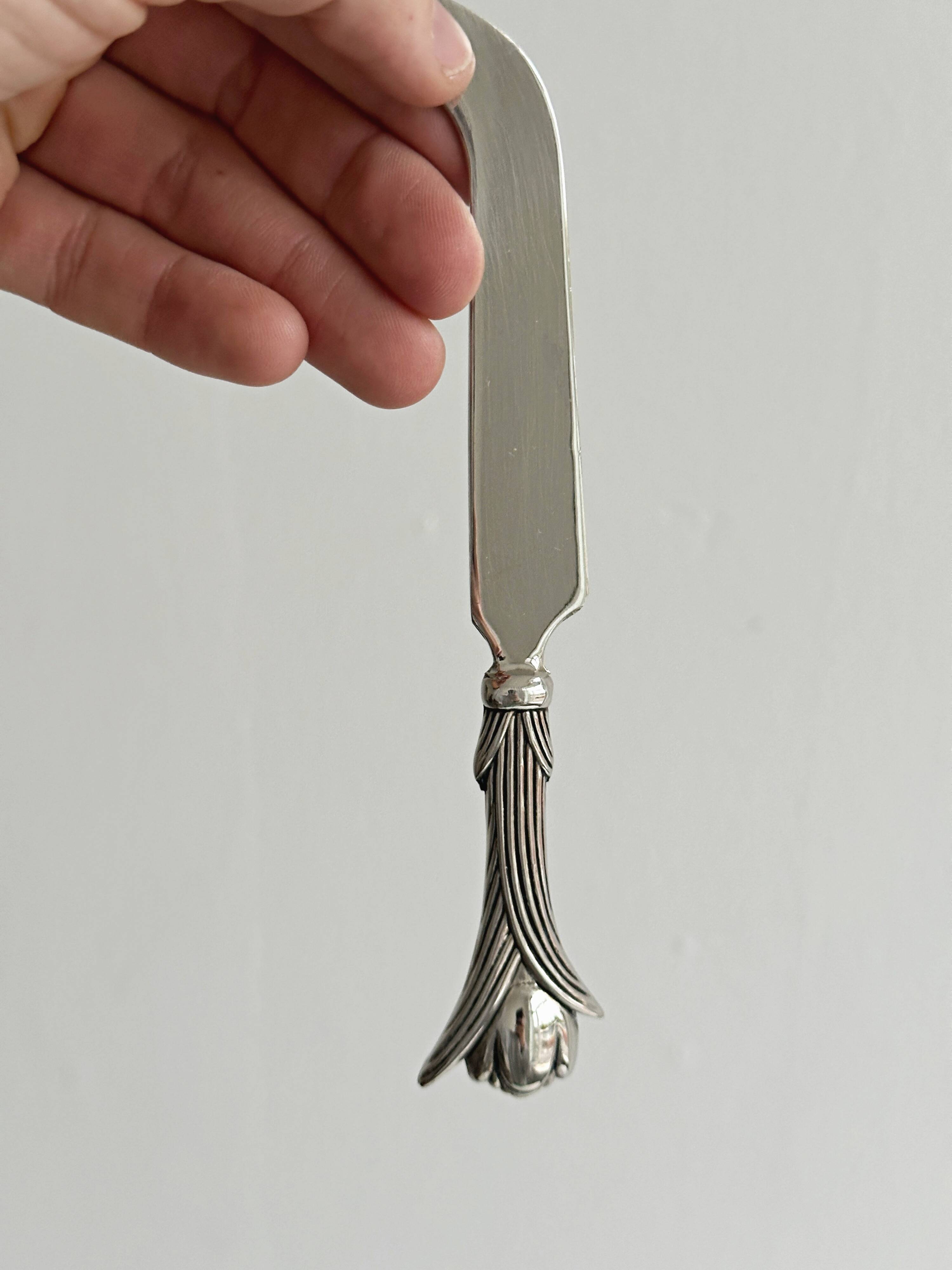 silver-plated cutlery with tulip design