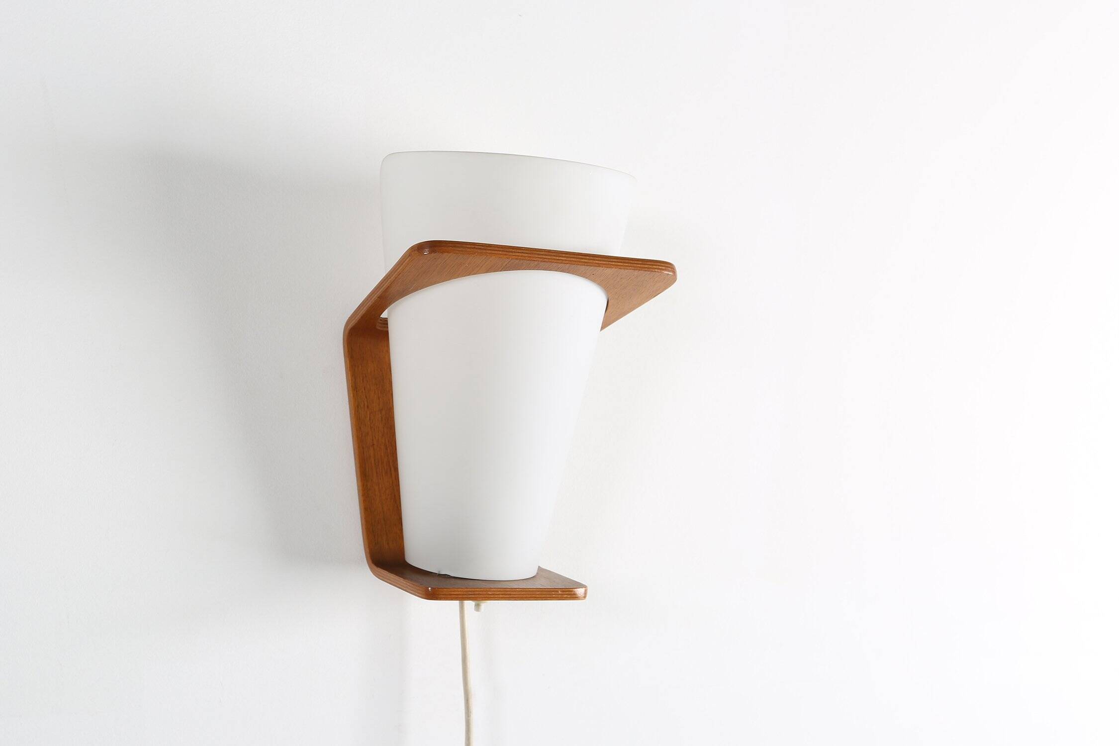 Wall Lamp in Curved Teak Plywood by Louis Kalff for Philips, 1959