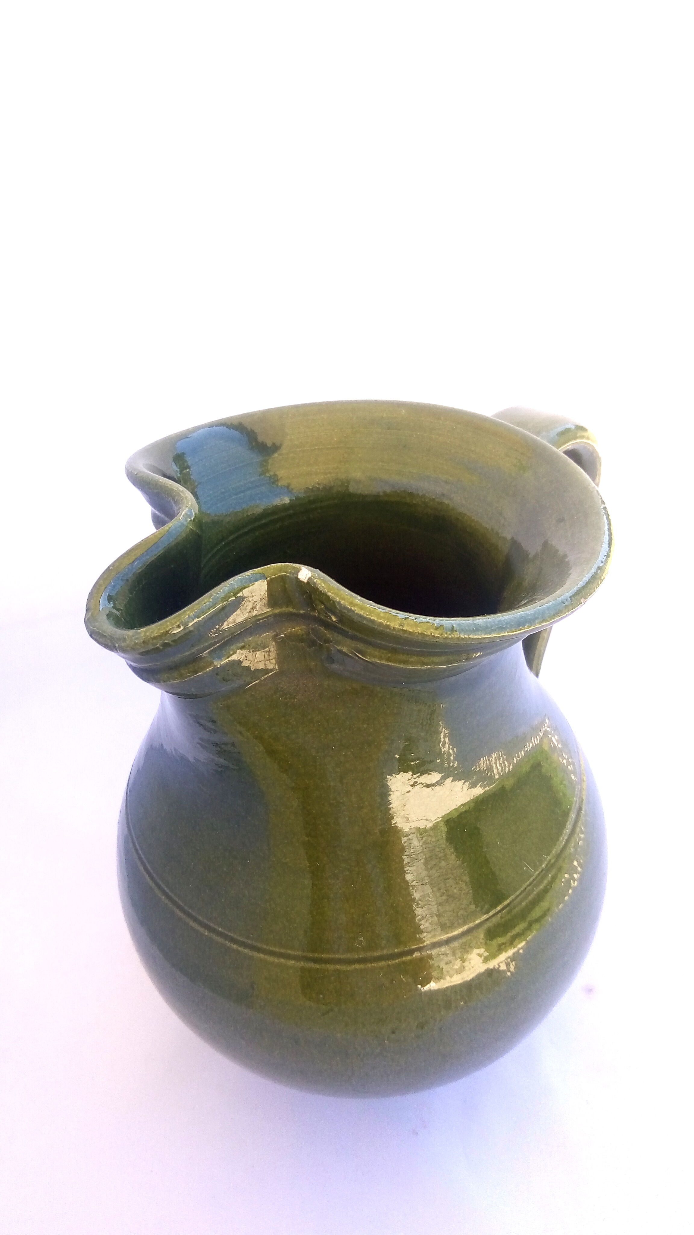 Green ceramic pitcher