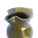 Green ceramic pitcher