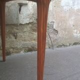 Extendable teak dining table