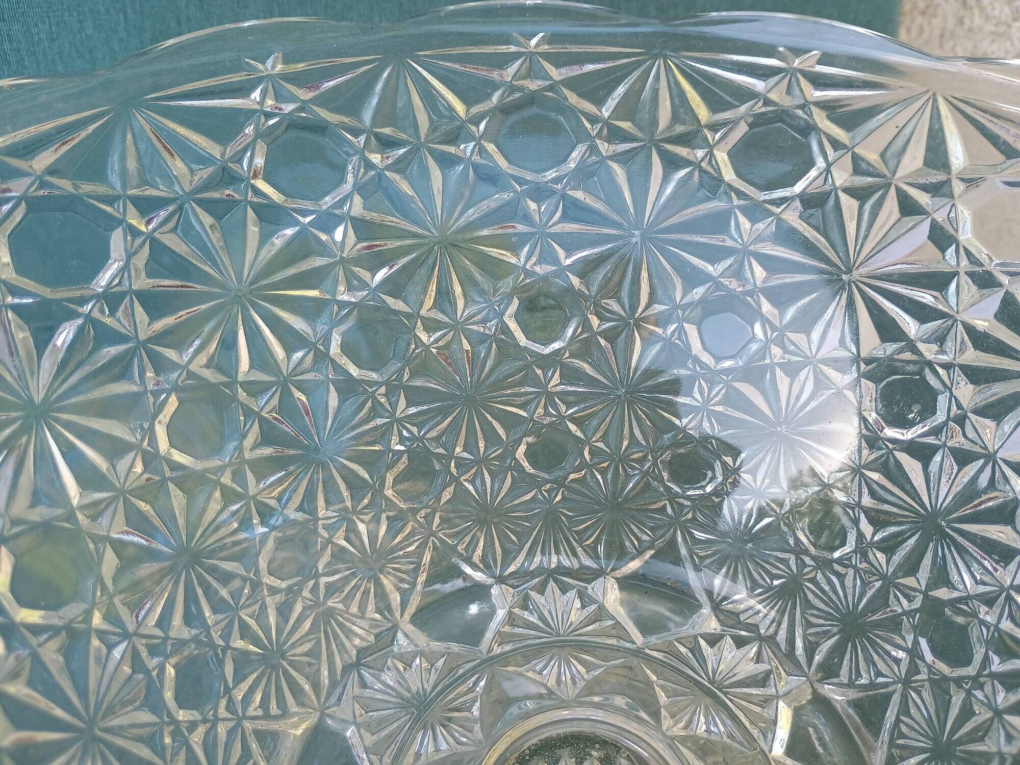 Flared fruit bowl with a pedestal, all made of pressed moulded glass, mid-20th century.