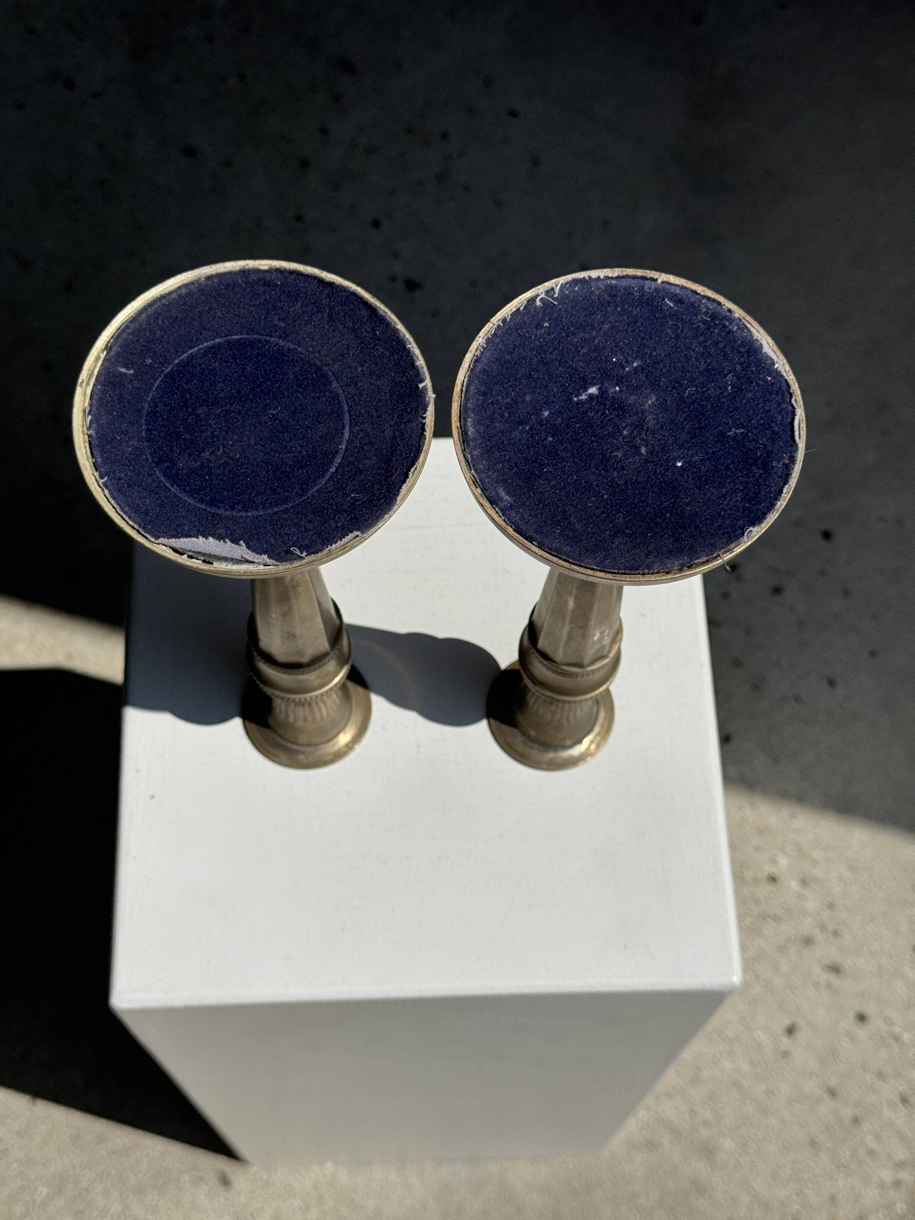 Pair of classic candlesticks in patinated gold metal H25