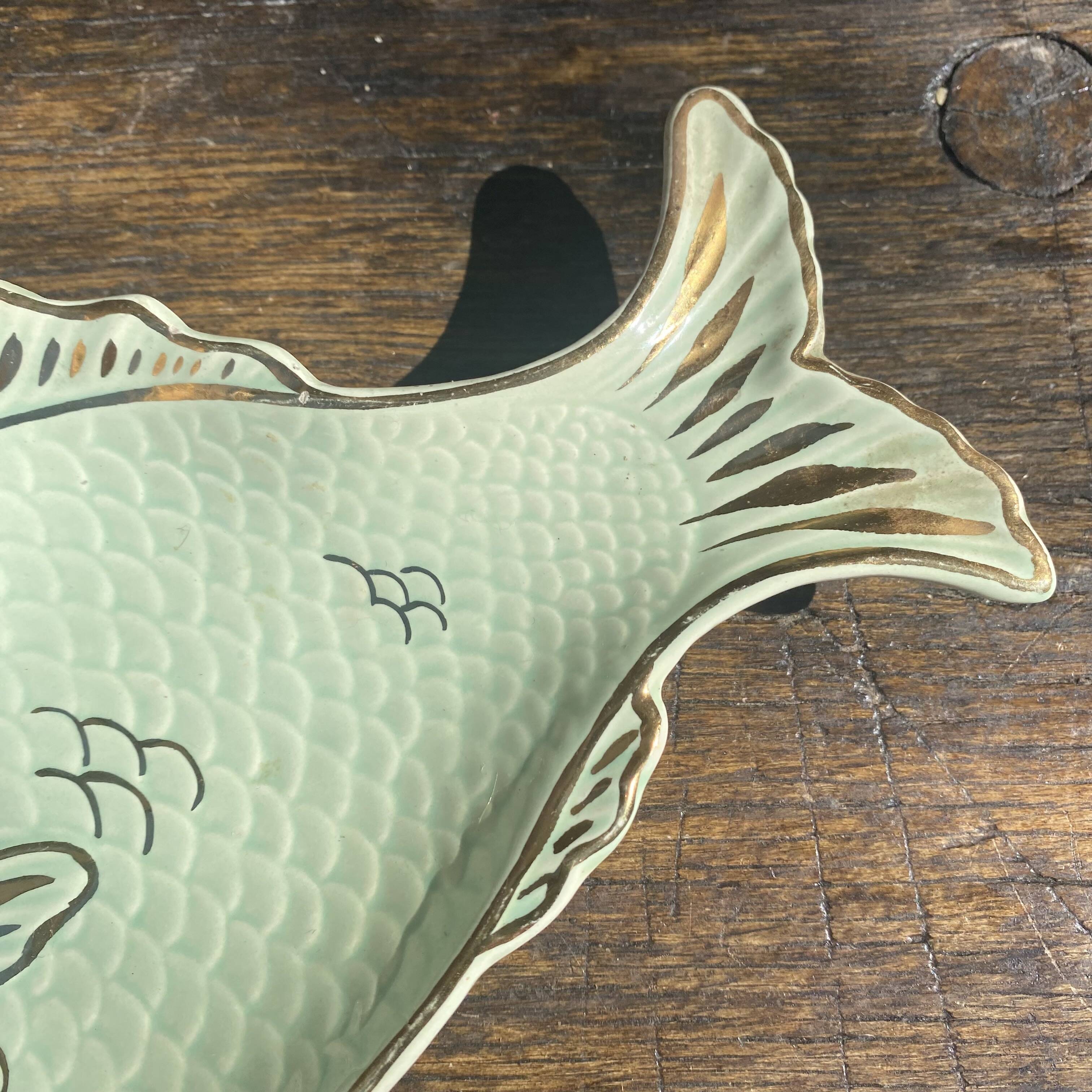 Small fish dish, pocket emptier.