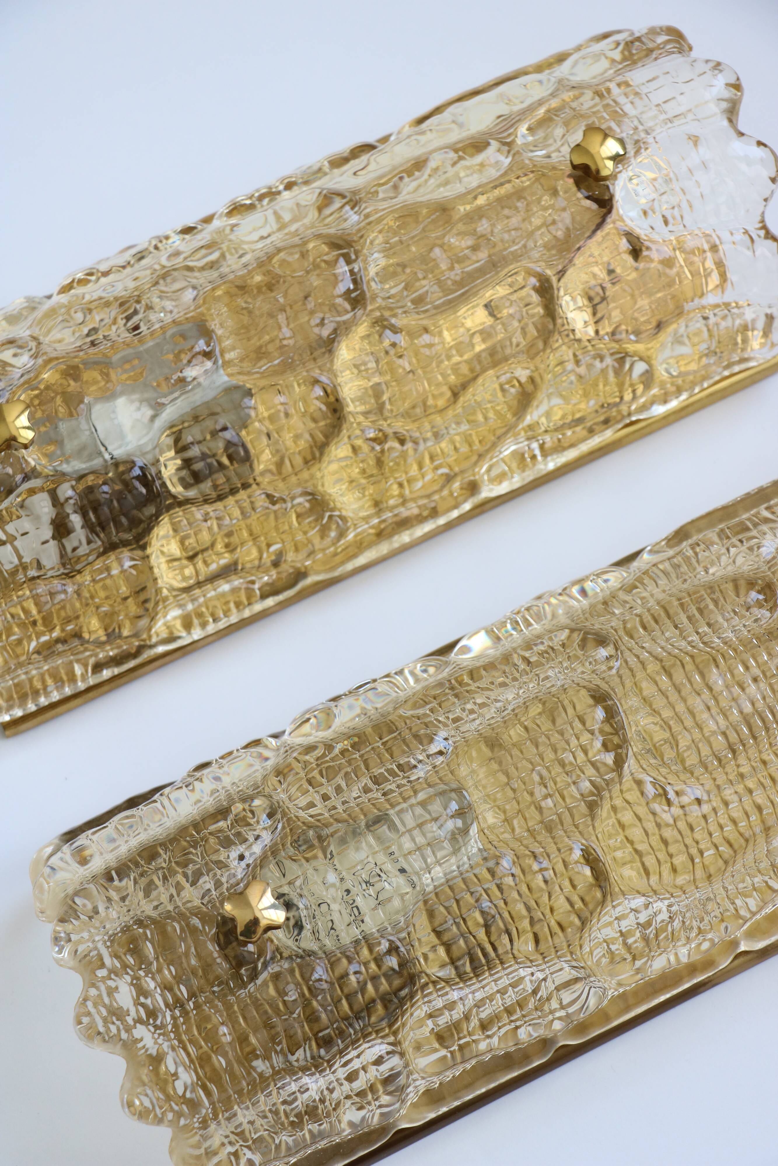 Pair of glass and brass wall lights by Carl Fagerlund for Orrefors, 1960.