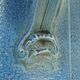 Pitcher in glazed blue sandstone signed