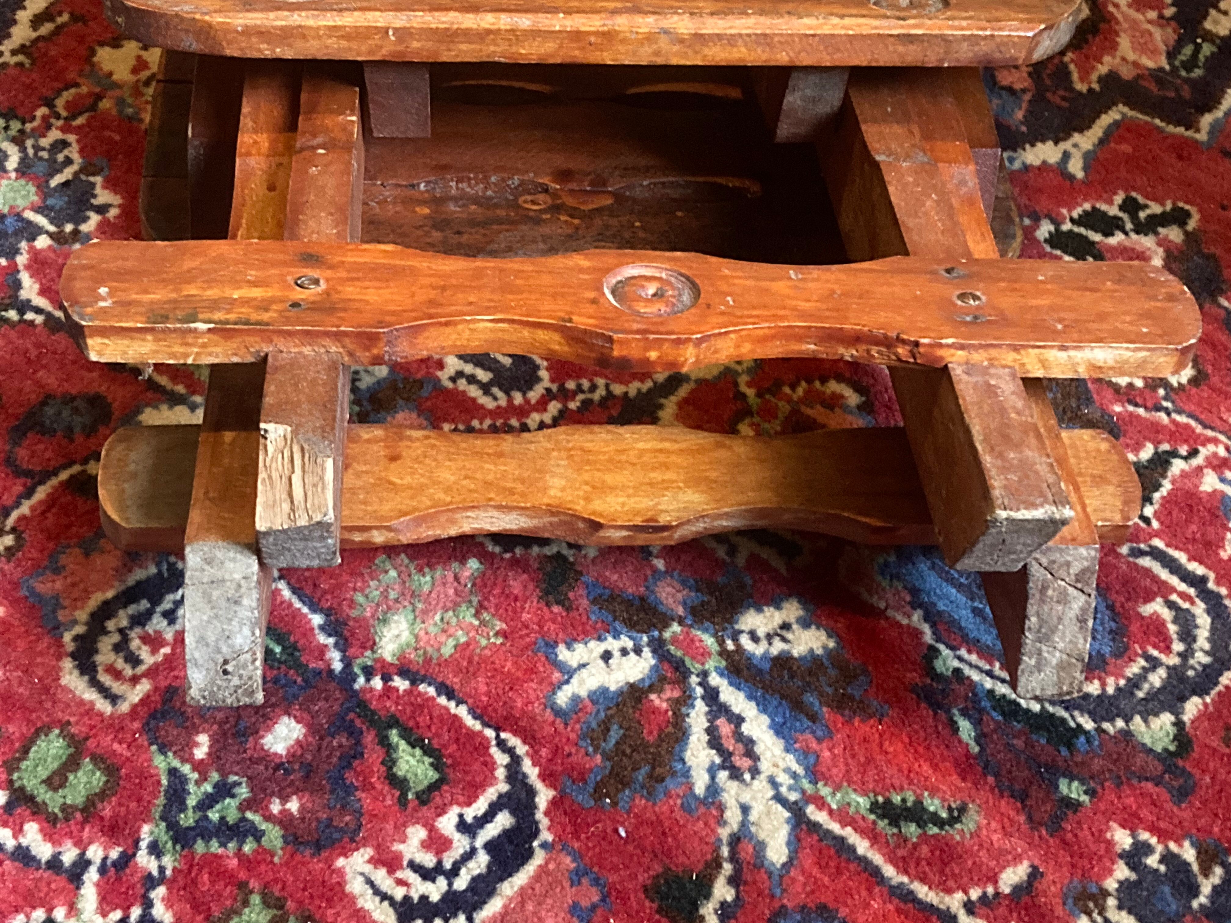 Pair of vintage folding wooden stools from Tyrol mountain