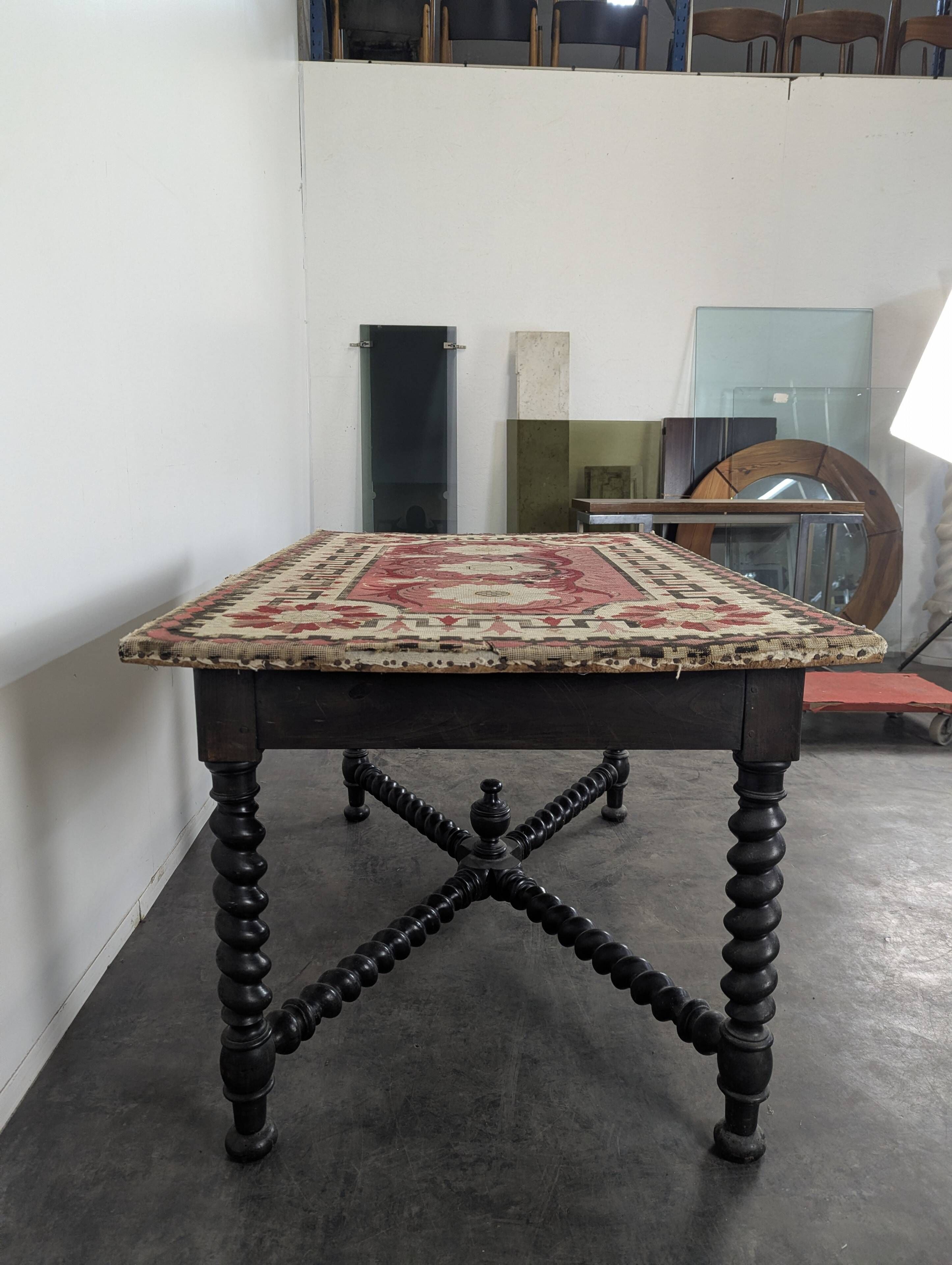 Louis XIII style table in blackened wood and tapestry