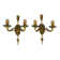 Pair of double-light Empire style arrow wall lights in bronze. Early 20th century