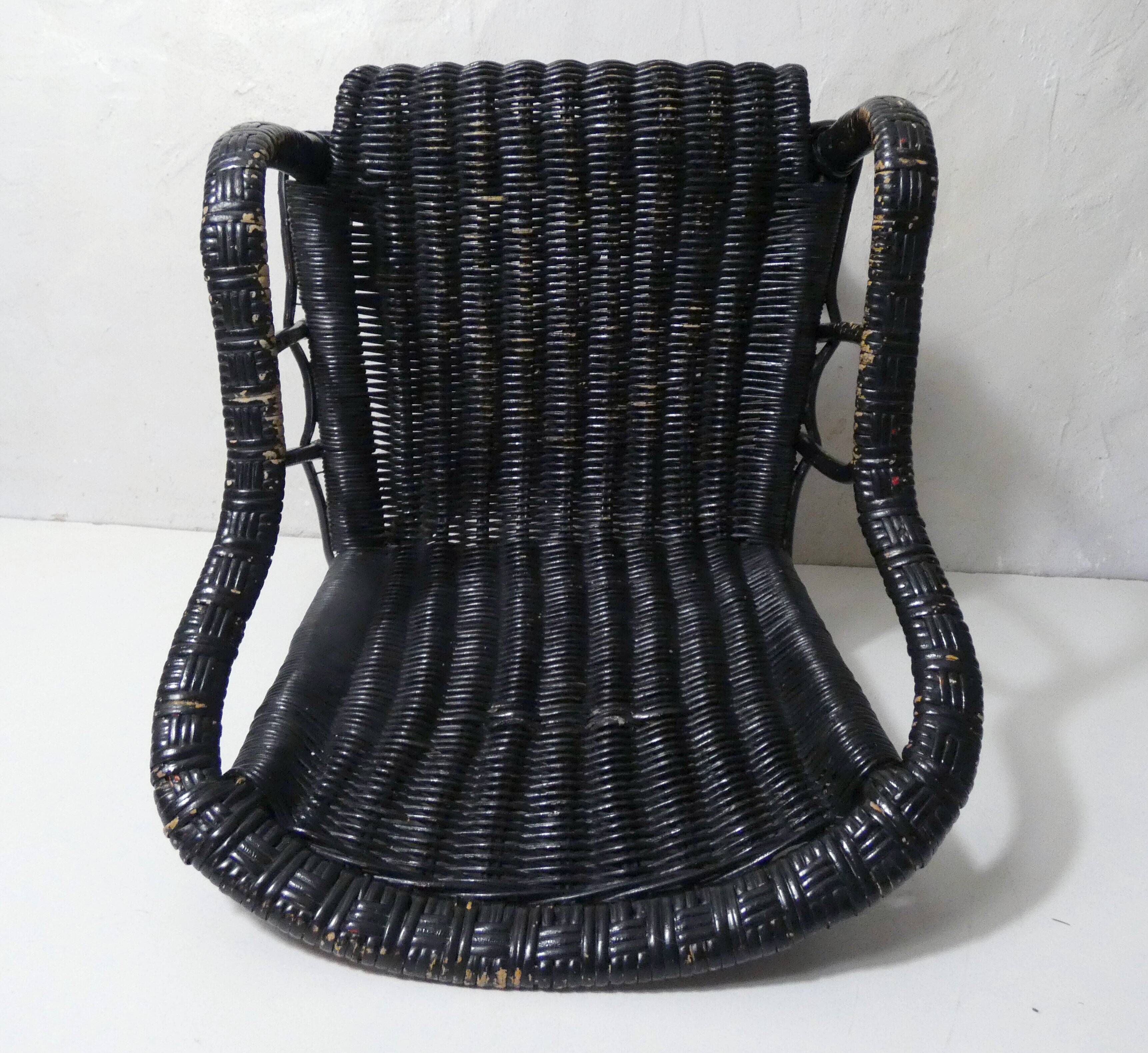 Vintage children's size rattan armchair