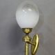 Pair of brass torchiere-style wall lights