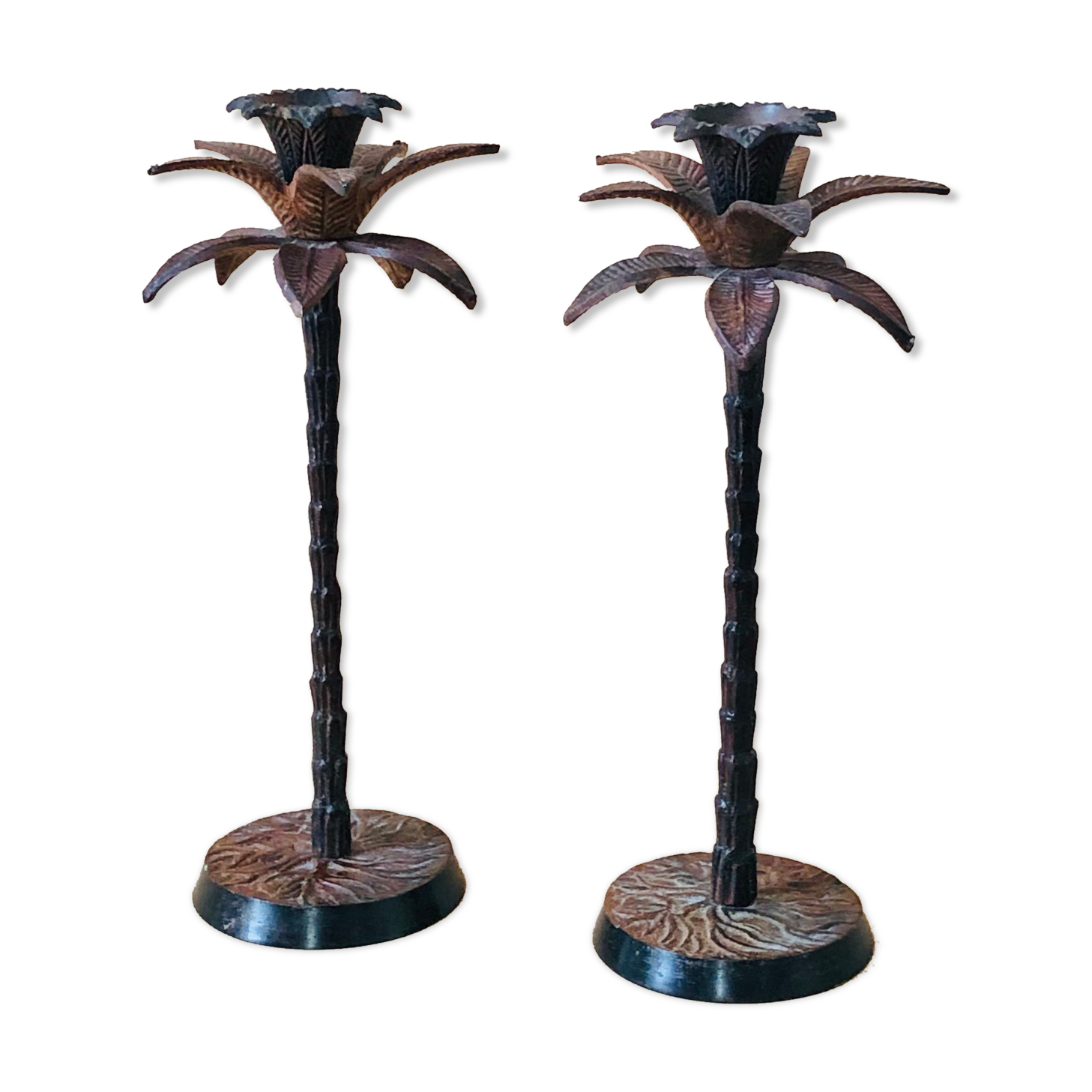Pair of patinated metal candlesticks